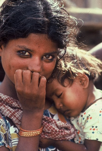 Street girl and her little sister